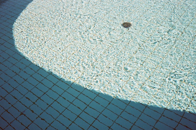 swimming pool with blue tiles 